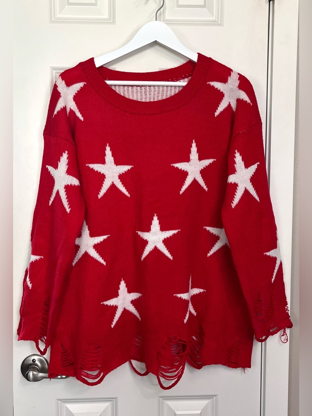 Seeing Stars Distressed Knit Sweater